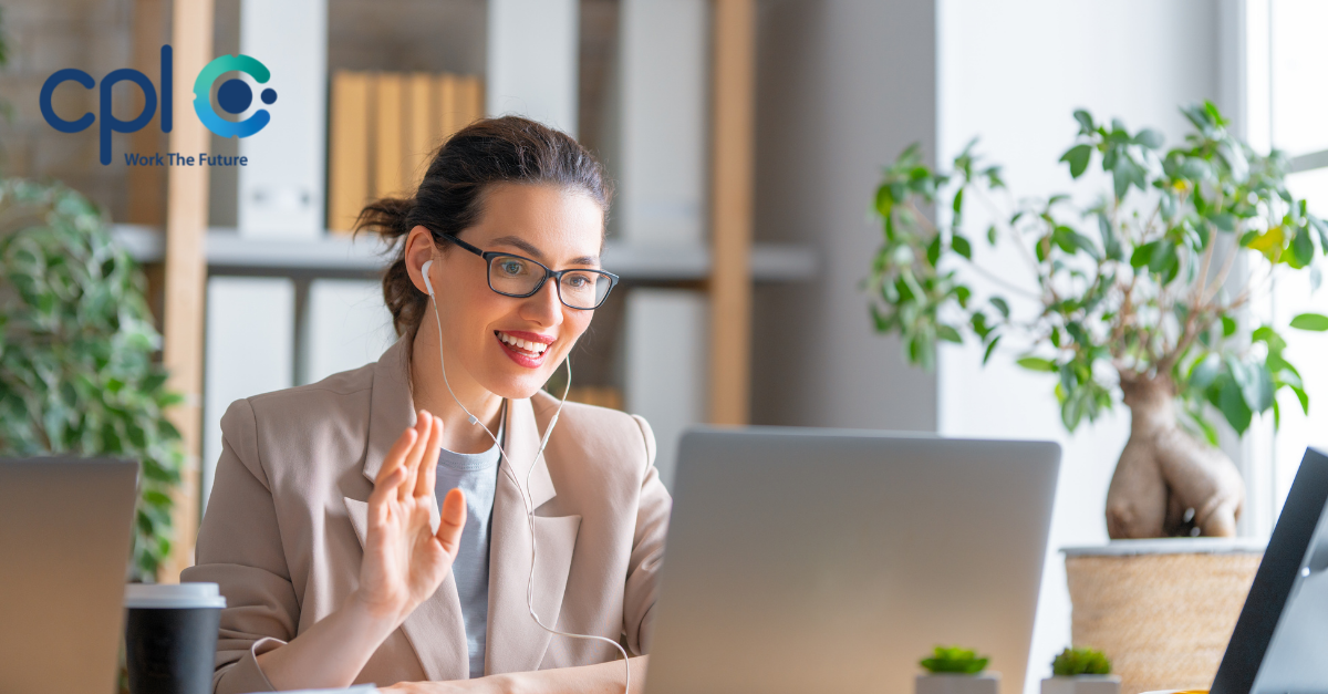 Smiling woman starting new job remotely.